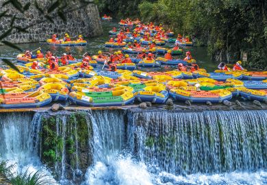 Tourists ride in inflatable boats as they go rafting in Cun an County, Hangzhou City, Zhejiang Province of China to illustrate African students on wrong side of China’s ‘two-track’ system