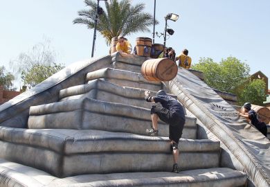 Contestants compete on the Barrel Roll at the Cuervo games in Tempe, Arizona to illustrate ‘Bumpy road’ ahead for US universities recruiting overseas