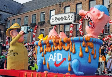 Carnival float depicting the secret service spying on right-wing party AfD in Dusseldorf. Carnival float depicting the secret service spying on right-wing party AfD in Dusseldorf. to illustrate German universities could be ‘less attractive’ as far right rises