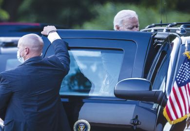 U.S. President Joe Biden gets into a vehicle with a person holding the door as a metaphor for Biden push for innovative NIH raises concern in Congress