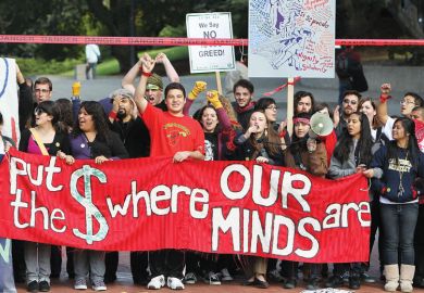 Student protest against funding cuts to illustrate Free college pledge alive despite defeat