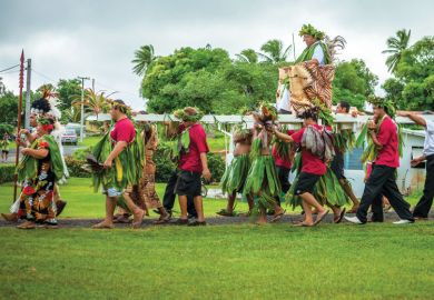 Makirau Haurua in traditional costume being carried on throne Makirau Haurua in traditional costume being carried on throne during investiture as a metaphor for New Zealand gives indigenous research big weightings boost