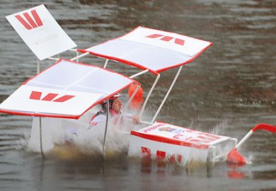 Pilot David Hyde crashes his plane into the Yarra River during the annual Birdman competition, in Melbourne to illustrate Record losses at Australian universities