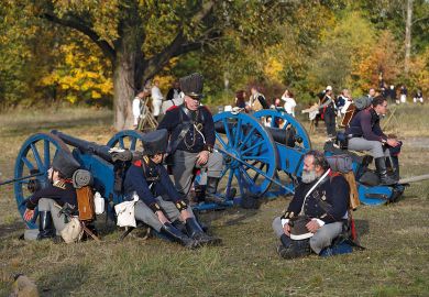 Members of historical clubs reenact the 1813 Battle of Leipzig during the Napoleonic War taking a break to illustrate Warning as Germany urged to revisit military research bar