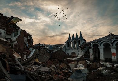 A flock of birds fly over a destroyed church at the skete of St. George’s Monastery in Dolyna, Ukraine A flock of birds fly over a destroyed church at the skete of St. George’s Monastery in Dolyna, Ukraine