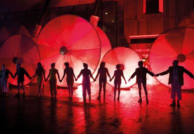 Performers holding hands ready for the final bow Performers holding hands ready for final bow to illustrate Drama college closure spotlights struggle for acting courses