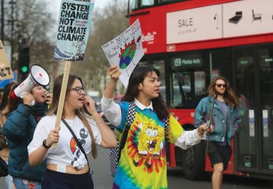  Students stage climate change demonstration around the Houses of Parliament in central London, to illustrate embed climate change education into all degrees, academics urge