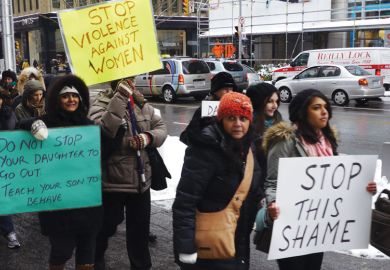 Woman, many of them of South-Asian origin, demonstrate in Toronto, Ontario to illustrate US and Canadian students protest over sexual assaults