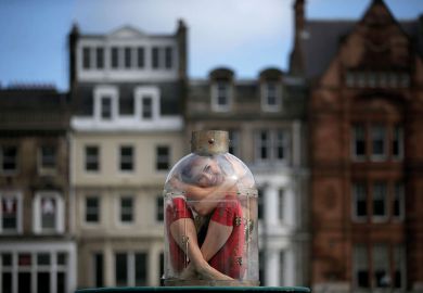 Contortionist Odka, from Cirque Berserk, sitting in a tiny bottle  Contortionist Odka, from Cirque Berserk, sitting in a tiny bottle to illustrate ‘Pod-sized’ rooms plan to reduce UK student rents