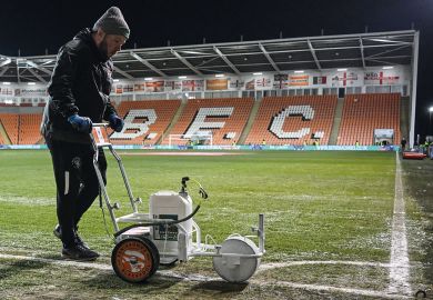 Ground staff paints the white lines of the football pitch in Blackpool Ground staff paints the white lines of the football pitch in Blackpool to illustrate What can academics and universities learn from Jo Phoenix’s employment tribunal victory