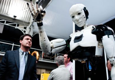 A humanoid robot on show to illustrate Funders mull robot reviewers for REF