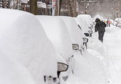 Line of cars stuck in the snow