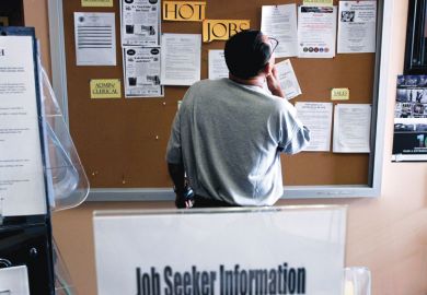 A job seeker looks at postings for jobs at the Verdugo Jobs Center, which includes a California Employment Development satellite office A job seeker looks at postings for jobs at the Verdugo Jobs Center, which includes a California Employment Development satellite office