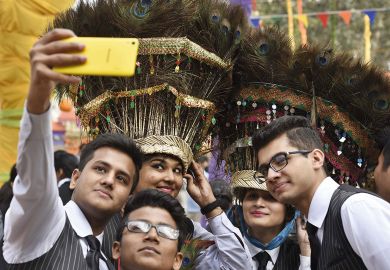 Students taking a photo during a press preview of the 30th International Surajkund Art Crafts Mela at Surajkund Students taking a photo during a press preview of the 30th International Surajkund Art Crafts Mela at Surajkund to illustrate Indian states blacklisted as Australian visa rejections soar