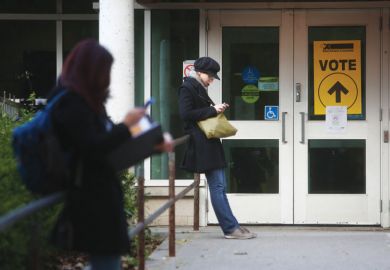  'Vote' signs outside a polling station in the University-Rosedale riding of Toronto as Canadians protest as on-campus voting axed for snap election