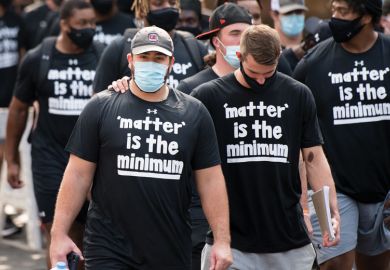  teammates and other student athletes on campus during a demonstration against racial inequality