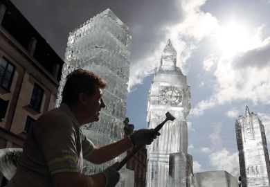 British ice sculptor Duncan Hamilton carves out ice from his sculpture of London's iconic Big Ben to illustrate Graduate visa review ‘can’t be allowed to threaten its existence’