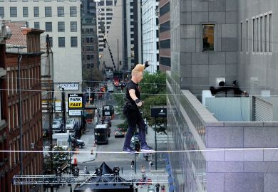 Bello Nock walks the high-wire at the South Street Seaport to illustrate Colleges tread carefully as race becomes admissions essays focus