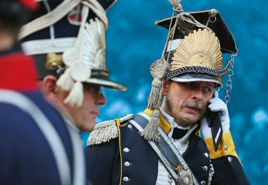 An actor in the role of a soldier in the 7th Polish Lancer Regiment talks on a mobile phone upon his arrival for the opening ceremony to commemorate the 200th anniversary of The Battle of Nations  An actor in the role of a soldier in the 7th Polish Lancer Regiment talks on a mobile phone upon his arrival for the opening ceremony to commemorate the 200th anniversary of The Battle of Nations