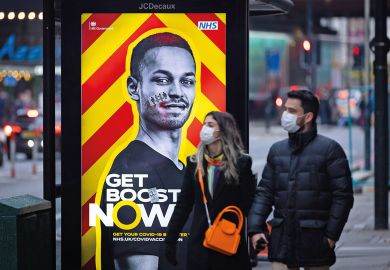 Government advertisement poster promoting the Covid-19 booster vaccine seen at a bus shelter in London to illustrate ‘Major outbreaks’ of Omicron likely on UK campuses, warn experts