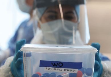 Live samples are held in a container during the opening of the new Covid-19 testing lab Live samples are held in a container during the opening of the new Covid-19 testing lab to illustrate UK sector leaders expect ‘striking’ pivot to science research
