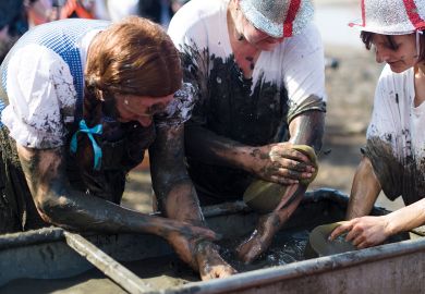 Participants try to wash some of the mud away at the end of the annual Maldon Mud Race in Maldon, Essex Participants try to wash some of the mud away at the end of the annual Maldon Mud Race in Maldon, Essex to illustrate Bid to cut grant administrative burden ‘may have opposite effect’