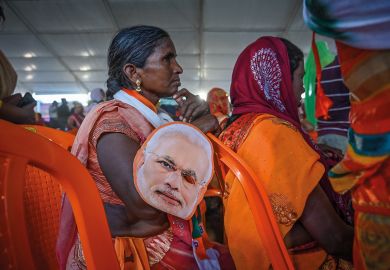 Supporters of the Bharatiya Janata Party (BJP) gather to hear India's Prime Minister Narendra Modi speak Supporters of the Bharatiya Janata Party (BJP) gather to hear India's Prime Minister Narendra Modi speak to illustrate Is Modi’s electoral setback  a win for Indian HE?