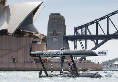SYDNEY, AUSTRALIA - DECEMBER 11: LINO SONEGO - Team Italia catamaran skippered by Enrico Zennaro (ITA) capsizes after being hit by a gust during racing in Sydney Harbour 