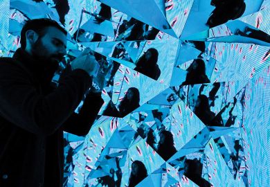 SYDNEY, AUSTRALIA - JUNE 06: A couple taking photos in an installation in the Samsung Galaxy Studio 