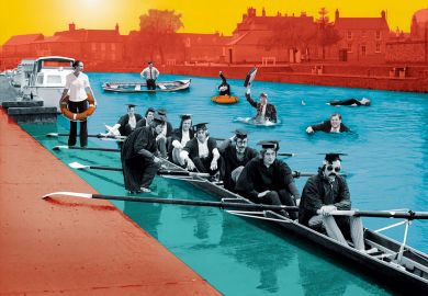 Graduates in rowing boat with people in suits in the water