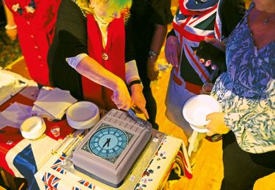 Cutting a cake in the form of Big Ben to illustrate London’s tight grip on  English higher education policy must be broken