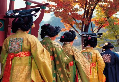 Group of women at the Royal Silk Festival in Seoul to illustrate Korean women’s universities forced to review single-sex status