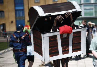 Person dressed as a treasure chest Person dressed as a treasure chest to illustrate university ‘supply’ key to lifelong learning entitlement