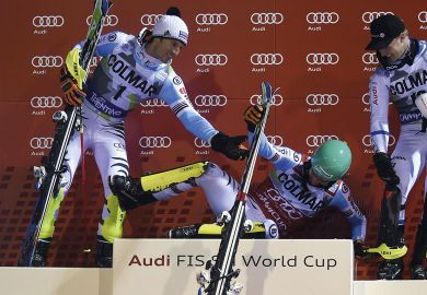 Second placed Germany's Fritz Dopfer (L) and third placed Sweden's Jens Byggmark (R) assists first placed Germany's Felix Neureuther (C) onto the podium after competing in the Men's Slalom event during the FIS Ski World Cup to illustrate Head of rectors’ 