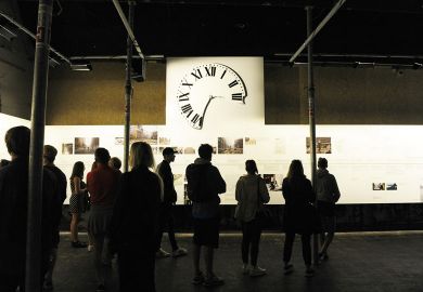 Visitors stand in front of of a 17-metre timeline of events including a clock face in Oslo, Norway. Visitors stand in front of of a 17-metre timeline of events including a clock face in Oslo, Norway to illustrate Norway nervous as international student fee deadline looms