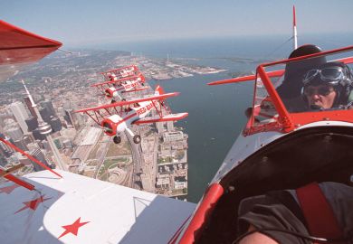 A group of pilots fly over Toronto Group of pilots fly over Toronto to illustrate Canada wants foreign students to access all areas across the country