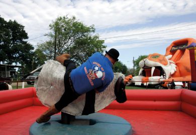 Texas Snake Handler falls off of a carnival ride o illustrate One year in, how is the University of Austin faring?