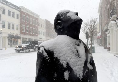 A snow covered sculpture is seen in Greenwich, Connecticut to illustrate Yale lawsuit signals US struggles on mental health exclusions