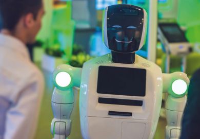 Man talking with a robot Man talking with a robot to illustrate ChatGPT assessed as ‘powerful tool for education if used correctly’