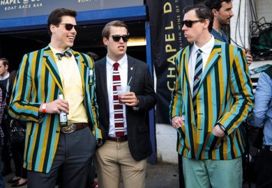 Spectators wearing boating blazers gather during the annual Boat Race between Oxford and Cambridge University Spectators wearing boating blazers gather during the annual Boat Race between Oxford and Cambridge University to illustrate rooting out elites’ influence