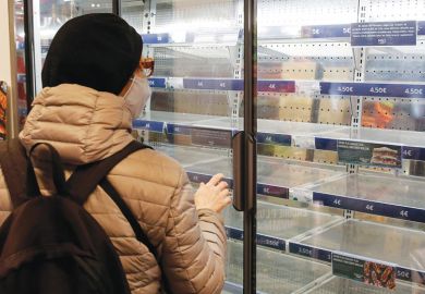 Person looking at empty shelves in a supermarket as a metaphor for Supply shortages snarl US laboratories