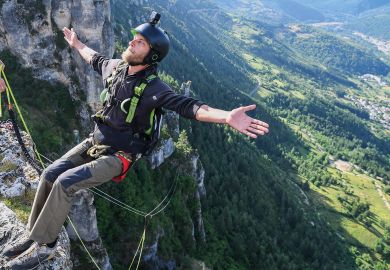 A man doing bungee jump from a cliff, Occitanie, Florac, France to illustrate French academics fear ‘grim’ funding situation ahead under Barnier