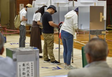 Voters fill out their ballots to vote in Tokyo to illustrate Sector pessimistic about funding as Japan goes to polls