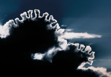 Sunlight shining through black cloud creating silver lining, East Yorkshire, UK