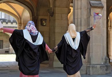 Malaysian students wearing gowns at their Melbourne University graduation Malaysian students wearing gowns at their Melbourne University graduation to illustrate International students ‘becoming happier’ than locals: surveys