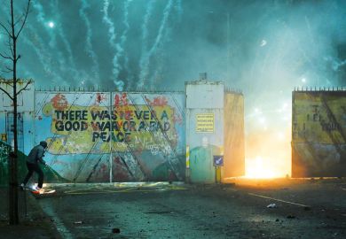 Nationalists and Loyalists riot against one another at the Peace Wall interface gates  to illustrate Academics back creation of pan-Irish higher education area