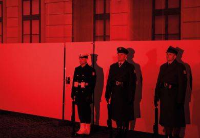 Polish soldiers guard the entrance of the Presidential Palace to illustrate Polish president stifles genocide researcher’s professorship bid