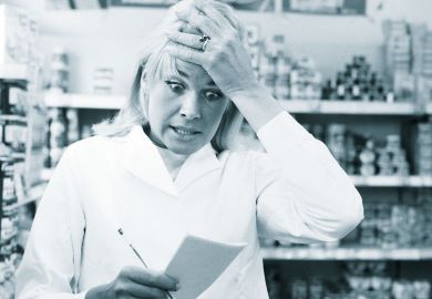 Shocked lady looking at her notepad Shocked lady looking at her notepad to illustrate UK rejects ‘inexplicable’ price hike for Nature journals