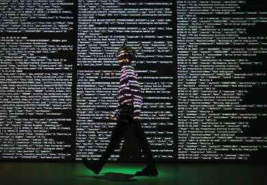 Person stands in a projection of live data feeds.