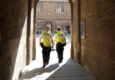 Security guards patrol Oxford University England UK  Security guards patrol Oxford University England UK to illustrate  Campus security is ‘much more than a grudge spend’